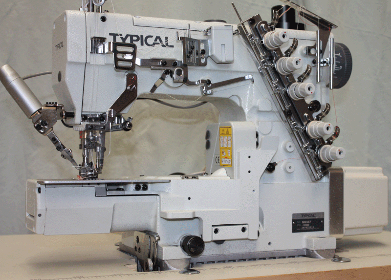 Typical cylinder arm thread trim cover stitch