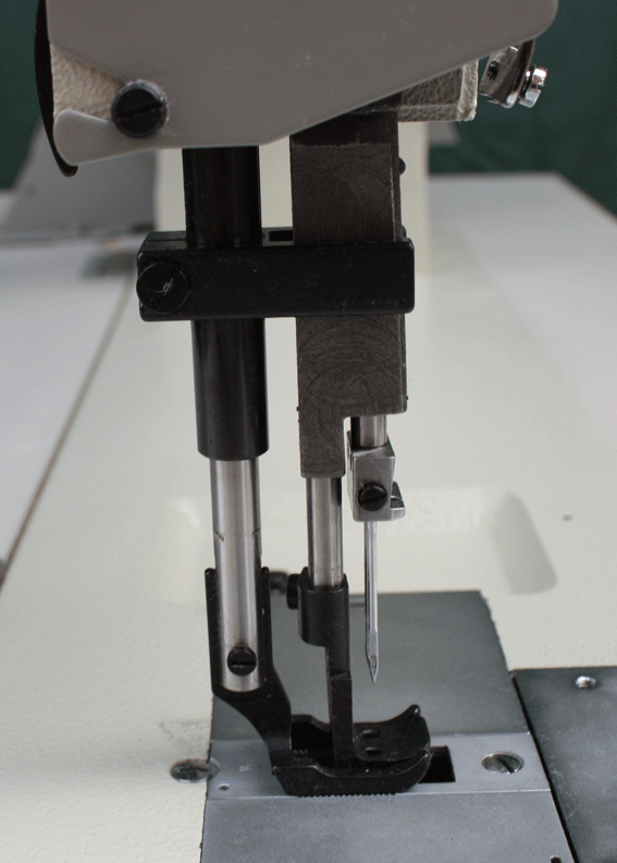 Typical long arm industrial sewing machine