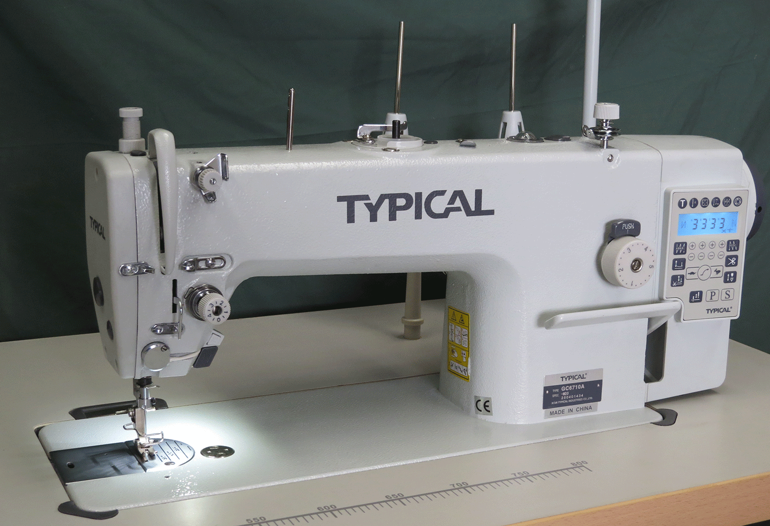 Typical fully automatic thread trim industrial sewing machine